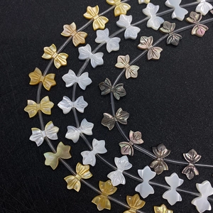 Natürliche Seemuschel-Perlen in Schleifenform in Weiß Gold und Grau für DIY-Schmuck