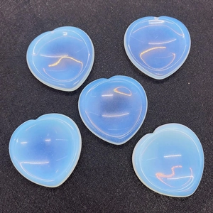 Polished heart-shaped opalite worry stones with smooth surface for stress relief
