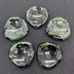 Polished Kambaba Jasper thumb stones with green spotted patterns for stress relief