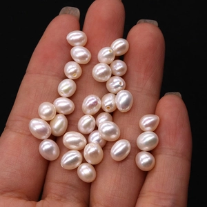 Natural rice-shaped freshwater pearl beads in milky white for handmade jewelry DIY