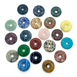 Assorted natural stone donut pendants including tiger eye and rose quartz for DIY necklaces