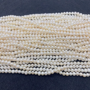 Close-up of AAA natural freshwater pearls for DIY jewelry with elegant warm white luster