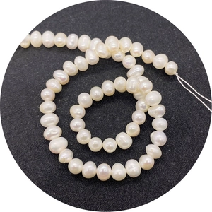 Natural white freshwater pearl strand for jewelry making with organic irregular shapes