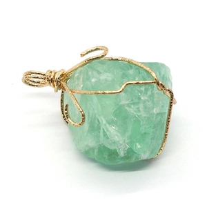 Handmade light green gradient raw gemstone pendant with gold wire wrapping