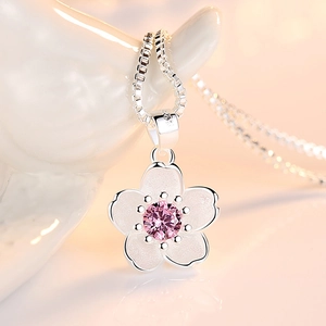 Elegant S925 silver cherry blossom pendant necklace with pink gemstone and matte petals