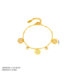 Vintage gold rose chain bracelet with white floral charms and cubic zirconia accents