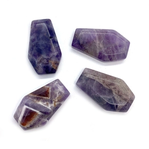 Chevron amethyst natural stones with hexagonal cut and polished purple V-shaped stripes