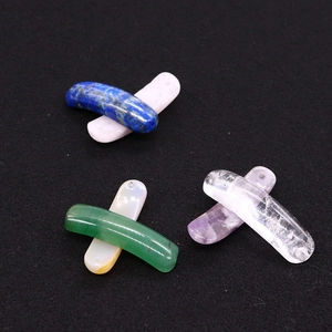 Macro shot of natural lapis and quartz stone pendants for DIY jewelry making