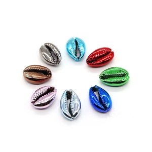 Polished electroplated natural cowrie shells in colorful metallic finishes for DIY jewelry