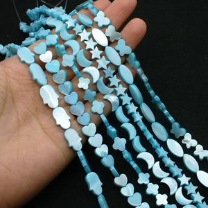 Perle in conchiglia blu naturale a forma di farfalla e cuore per creazione gioielli