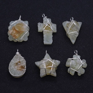 Set of six handmade silver-wired citrine crystal pendants in various geometric shapes