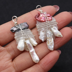 Handmade wire-wrapped claw pendants with baroque pearls and raw crystal stones