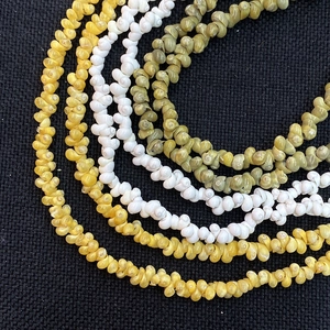 Natürliche Seeschneckenperlen in Weiß und Gold für DIY-Schmuckhalsketten Zubehör