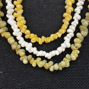 Natürliche Spiralmuscheln in Weiß Gelb und Grün für DIY Schmuckherstellung