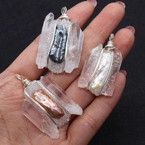 Handmade clear crystal quartz pendants with baroque pearls and wire wrapping detail