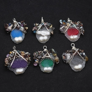 Handmade wire wrapped freshwater pearl pendants set with assorted natural crystal stones