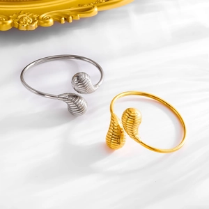 Minimalistische open armbanden van roestvrij staal met waterdruppeltextuur in goud en zilver