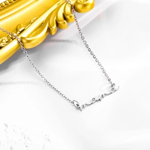 Minimalist silver mama letter necklace in stainless steel on a white decorative background