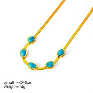 Halskette aus Titanstahl mit türkisfarbenen Tropfen und Goldfinish im Blade-Chain-Stil