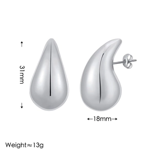 Detailed view of silver teardrop earrings with dimensions 31mm by 18mm and high polish finish