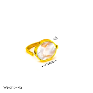 Detail view of gold rotating ring showing 17mm white marble disc and 4g weight spec