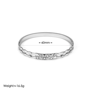 Detailed close-up of silver bamboo style bangle with dimensions 60mm and 16.5g weight