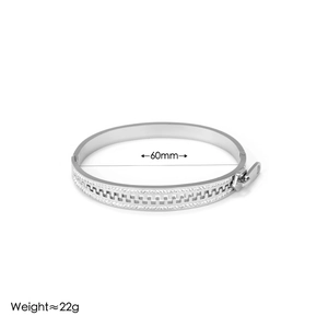 Silver zipper bangle in gear design with double row cubic zirconia accents, 60mm diameter