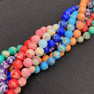 Macro detail of colorful imperial stone beads with natural texture for DIY jewelry