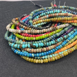 Macro shot of colorful flat round emperor stone beads for DIY jewelry making