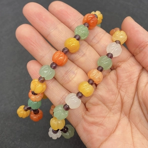 Mixed color natural stone pumpkin beads bracelet featuring yellow and white jade stones