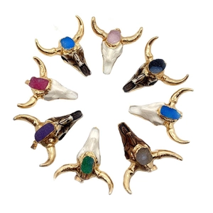 Set of 8 bohemian cattle skull pendants with crystal stones and golden metallic horns