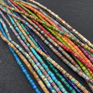 Macro view of 4x4mm colorful cylindrical stone beads with natural texture for DIY jewelry