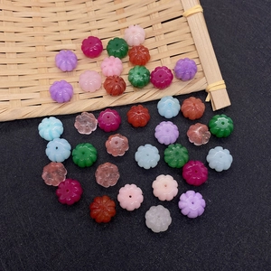 Détail de perles en pierre de 14mm en forme de citrouille pour création de bijoux DIY