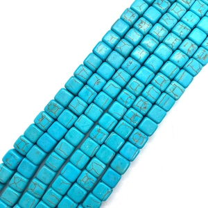 Close-up of square turquoise beads with natural brown matrix texture for jewelry DIY