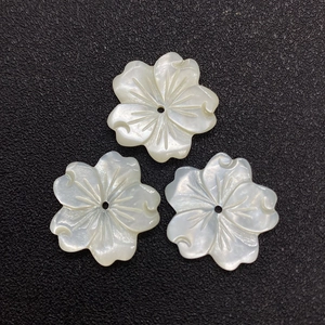 Three pieces of white natural shell flower beads with petal carving for DIY jewelry making