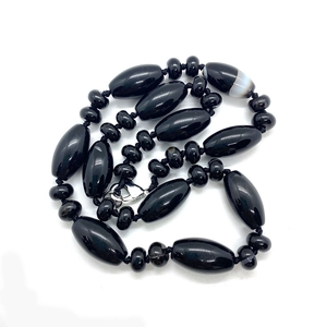 Black natural stone cylinder beads necklace with striped agate accent and silver clasp