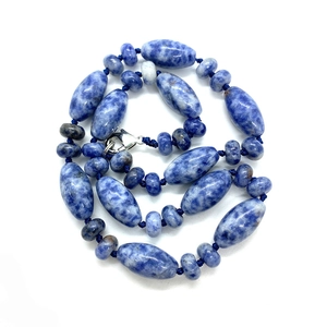 Natural sodalite beaded necklace with blue and white cylindrical stones and lobster clasp