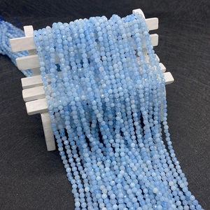 Macro view of multifaceted light blue natural apatite beads for jewelry making