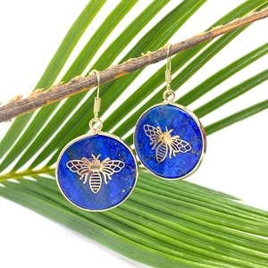 Lapis lazuli round earrings with gold bee motif on branch with green leaves