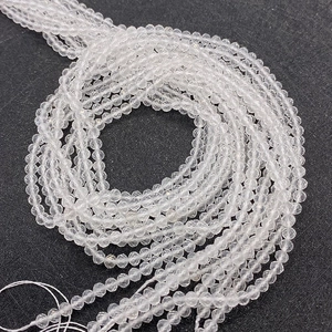 Macro view of 2-4mm faceted clear quartz loose beads for DIY jewelry making