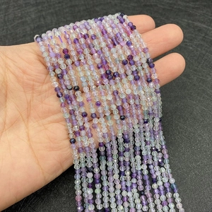 Macro detail of faceted natural purple amethyst beads for DIY jewelry making