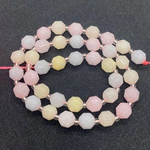 Detail of faceted hexagonal rose quartz beads and agate spacers in macaron colors