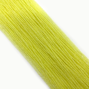 Macro detail of 2mm neon lime green cat eye beads for delicate DIY jewelry making