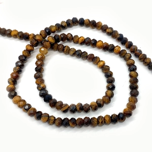 Faceted natural tiger eye gemstone beads in spiral arrangement for DIY jewelry