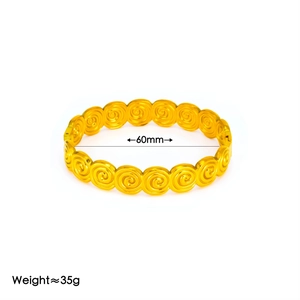 Bracciale rigido aperto in acciaio al titanio placcato oro 18K con cerchi concentrici