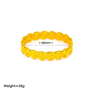 Bracciale rigido in acciaio al titanio placcato oro 18K con motivo a rilievo