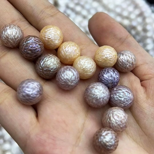 Macro detail of natural freshwater pearls with unique dragon scale texture and iridescent sheen
