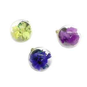 Spherical glass pendant with dried flowers and gold metal loop for jewelry making