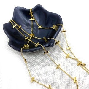 Golden twist rectangular link chain with T-bar pendants for DIY jewelry making
