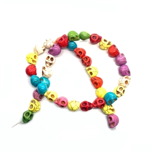 Multi-color skull shaped turquoise stone beads for DIY jewelry making in various vibrant hues